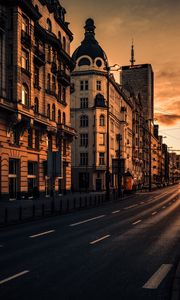 Preview wallpaper city, buildings, architecture, road, cars, sunset