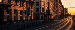 Preview wallpaper city, buildings, architecture, road, cars, sunset