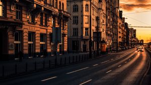 Preview wallpaper city, buildings, architecture, road, cars, sunset