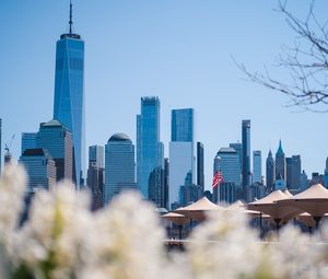Preview wallpaper city, buildings, architecture, flowers, blur