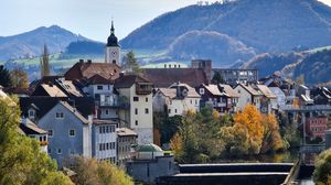 Preview wallpaper city, buildings, architecture, mountains, river