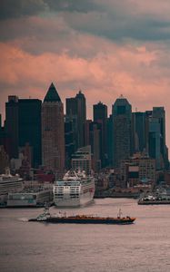 Preview wallpaper city, buildings, architecture, water, pier, twilight