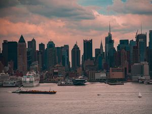 Preview wallpaper city, buildings, architecture, water, pier, twilight