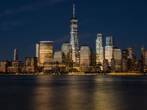 Preview wallpaper city, buildings, architecture, metropolis, lights, water, twilight