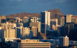 Preview wallpaper city, buildings, architecture, mountains, twilight