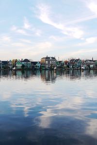 Preview wallpaper city, buildings, architecture, lake, reflection