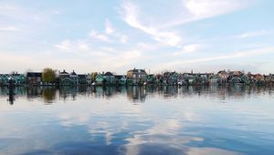 Preview wallpaper city, buildings, architecture, lake, reflection