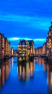 Preview wallpaper city, buildings, architecture, river, twilight
