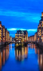 Preview wallpaper city, buildings, architecture, river, twilight