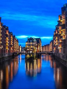Preview wallpaper city, buildings, architecture, river, twilight