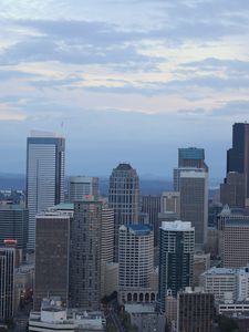 Preview wallpaper city, buildings, architecture, aerial view, twilight