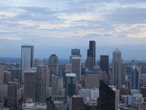 Preview wallpaper city, buildings, architecture, aerial view, twilight