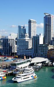 Preview wallpaper city, buildings, architecture, pier, boats, aerial view