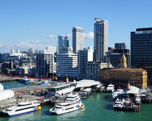 Preview wallpaper city, buildings, architecture, pier, boats, aerial view