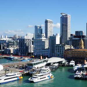 Preview wallpaper city, buildings, architecture, pier, boats, aerial view