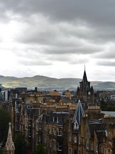 Preview wallpaper city, buildings, architecture, mountains, aerial view