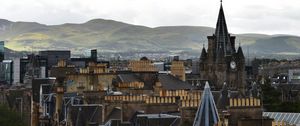 Preview wallpaper city, buildings, architecture, mountains, aerial view