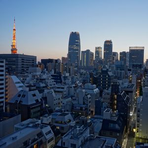 Preview wallpaper city, buildings, architecture, lights, twilight, aerial view