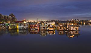 Preview wallpaper city, buildings, architecture, backlighting, water, reflection