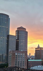 Preview wallpaper city, buildings, architecture, aerial view, sunset