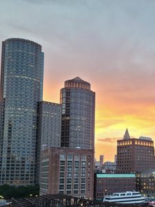Preview wallpaper city, buildings, architecture, aerial view, sunset