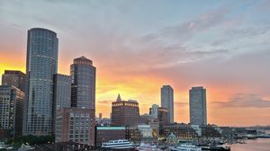 Preview wallpaper city, buildings, architecture, aerial view, sunset