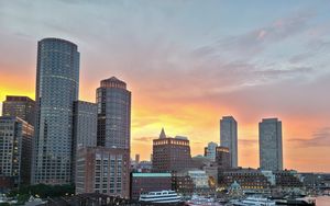 Preview wallpaper city, buildings, architecture, aerial view, sunset