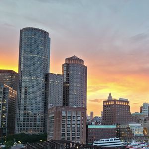 Preview wallpaper city, buildings, architecture, aerial view, sunset