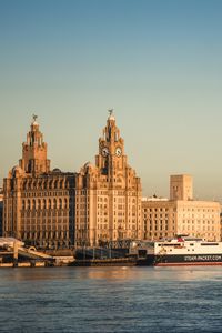 Preview wallpaper city, buildings, architecture, river, pier