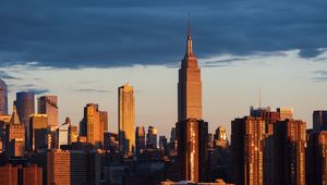 Preview wallpaper city, buildings, architecture, sunset, aerial view