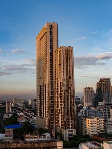 Preview wallpaper city, buildings, architecture, trees, twilight, aerial view