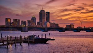 Preview wallpaper city, buildings, architecture, water, pier, sunset