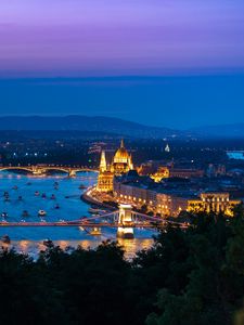 Preview wallpaper city, buildings, backlight, water, twilight, aerial view