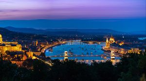 Preview wallpaper city, buildings, backlight, water, twilight, aerial view