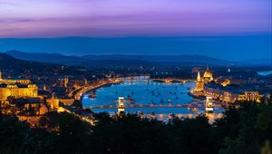 Preview wallpaper city, buildings, backlight, water, twilight, aerial view