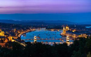 Preview wallpaper city, buildings, backlight, water, twilight, aerial view