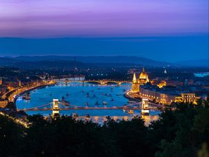 Preview wallpaper city, buildings, backlight, water, twilight, aerial view