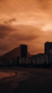 Preview wallpaper city, buildings, beach, mountains, twilight, dark