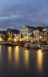 Preview wallpaper city, buildings, boats, water, lights, twilight