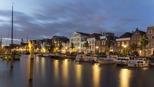 Preview wallpaper city, buildings, boats, water, lights, twilight