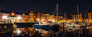 Preview wallpaper city, buildings, boats, pier, night, dark