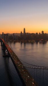 Preview wallpaper city, buildings, bridge, evening, water