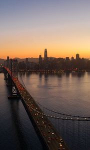 Preview wallpaper city, buildings, bridge, evening, water