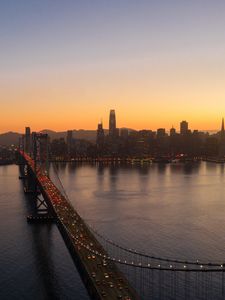 Preview wallpaper city, buildings, bridge, evening, water
