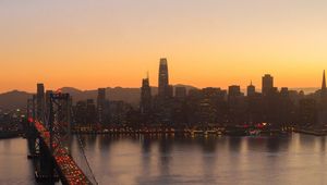 Preview wallpaper city, buildings, bridge, evening, water
