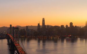 Preview wallpaper city, buildings, bridge, evening, water