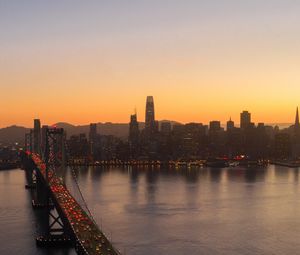 Preview wallpaper city, buildings, bridge, evening, water