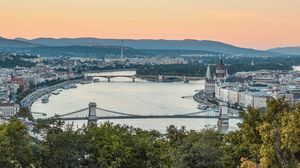 Preview wallpaper city, buildings, bridge, trees, river