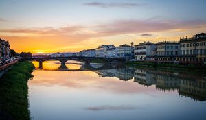 Preview wallpaper city, buildings, bridge, lake, reflection, sunset