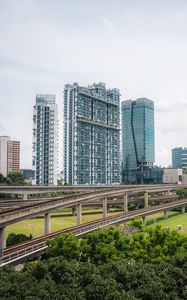 Preview wallpaper city, buildings, bridge, road, junction, trees